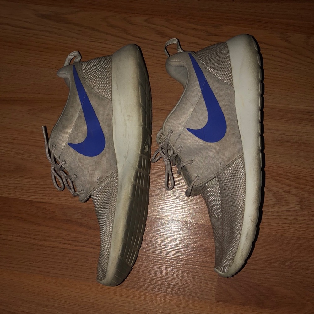 Grey and blue Nike roshe